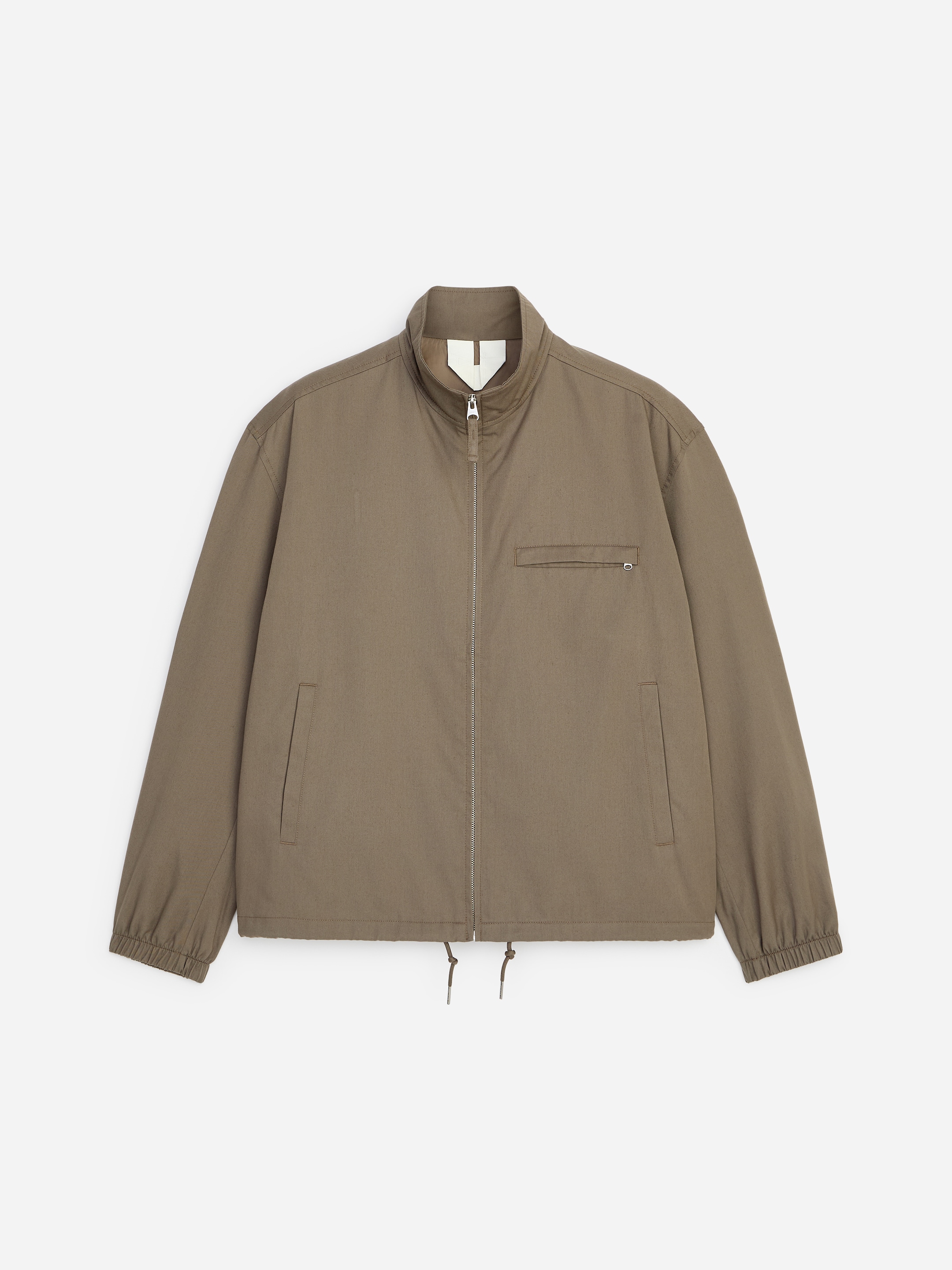 Khaki zip-up jacket with a high collar, two side pockets, and a chest pocket. Elastic cuffs and adjustable drawstring at the hem.