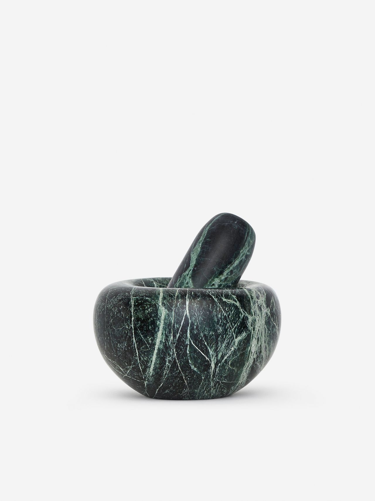 Dark green marble mortar and pestle with white veining, set against a plain white background.