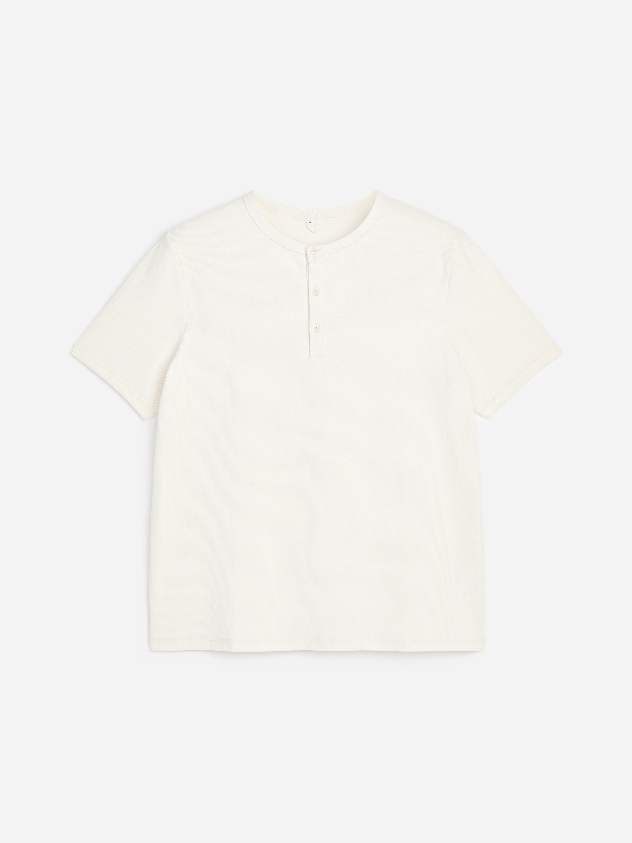 White short-sleeve henley shirt with a round collar and three button placket on a plain background.