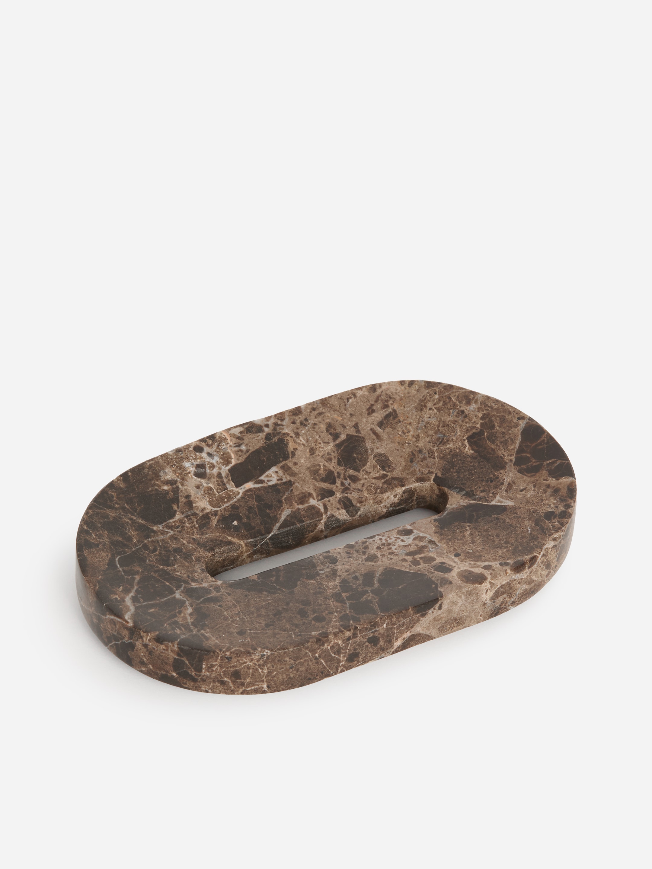 Oval brown marble soap dish with a central drain slot, featuring a polished surface and intricate veining, on a white background.