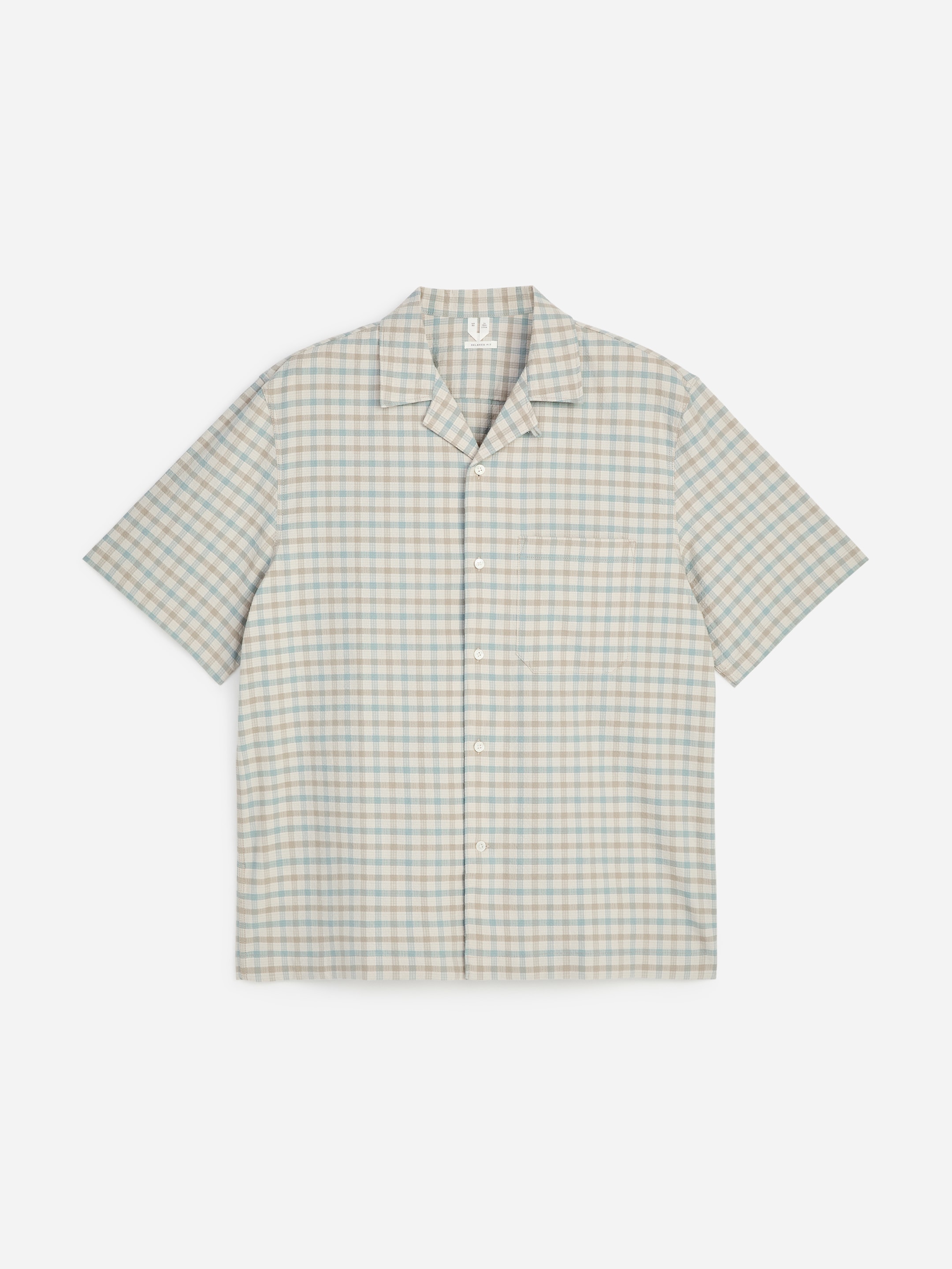 Short-sleeved shirt with a light blue and beige plaid pattern, featuring a collar and button-up front.