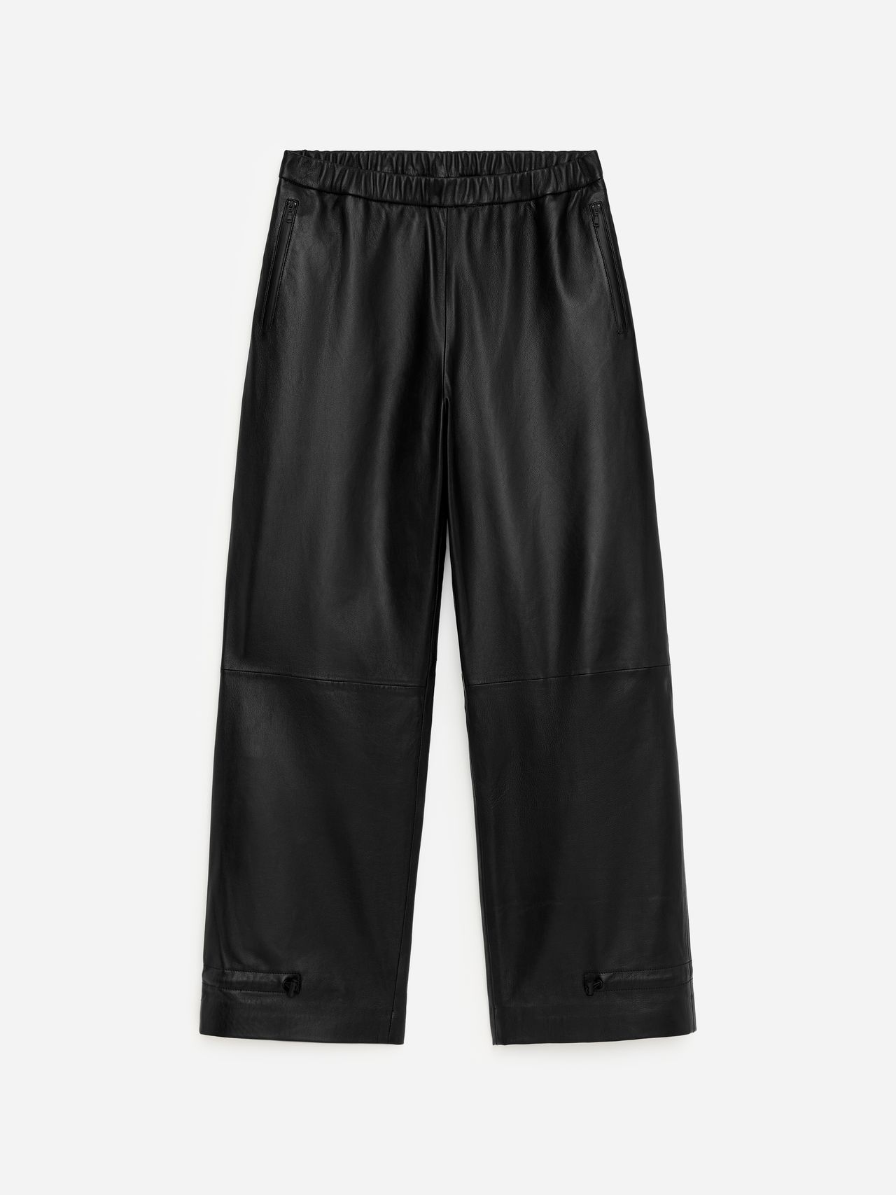 Black wide-leg faux leather pants with an elastic waistband and side pockets, shown laid flat against a white background.