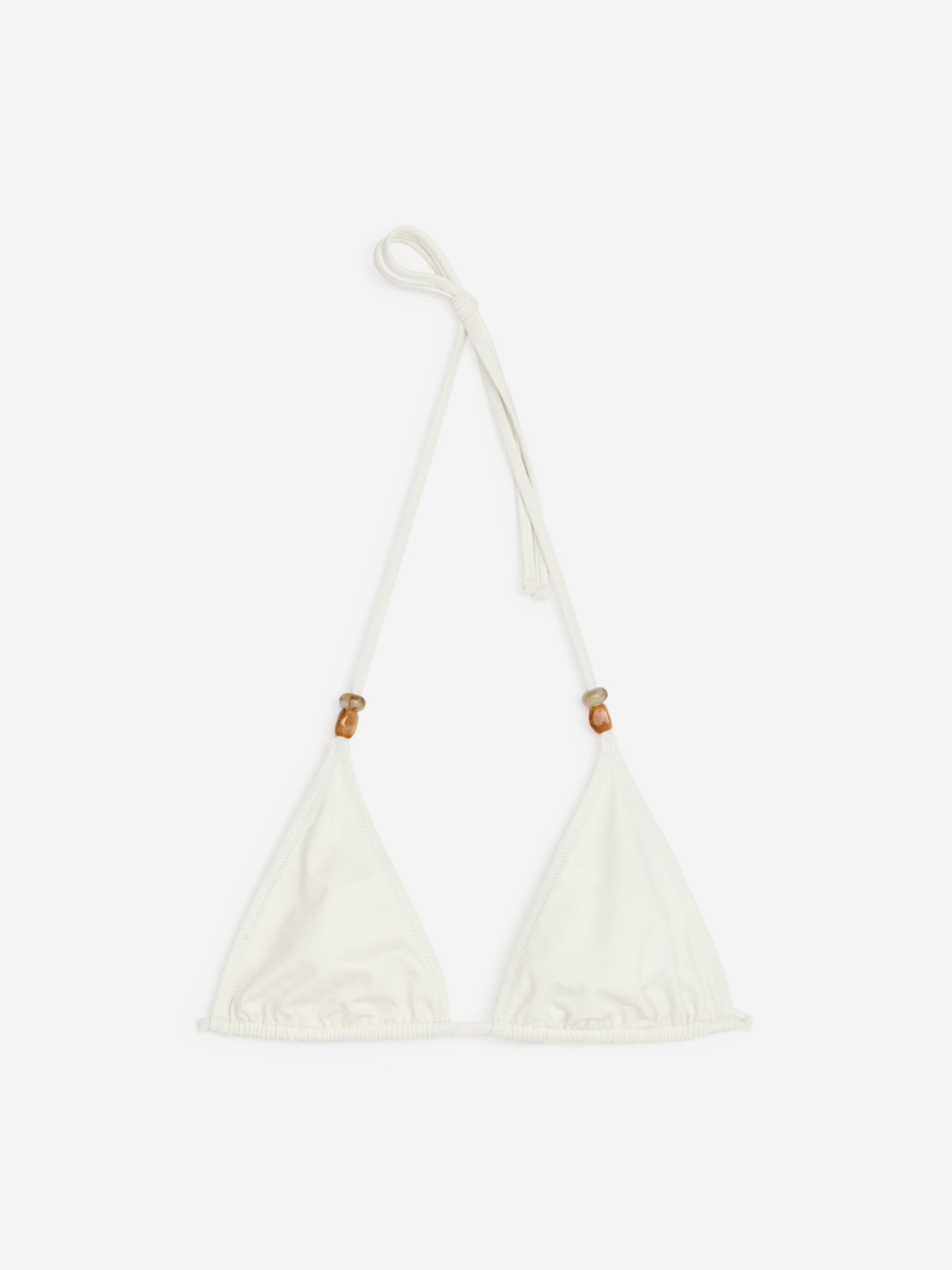 White triangle bikini top with adjustable neck and back ties, featuring small wooden beads on the straps, against a plain background.