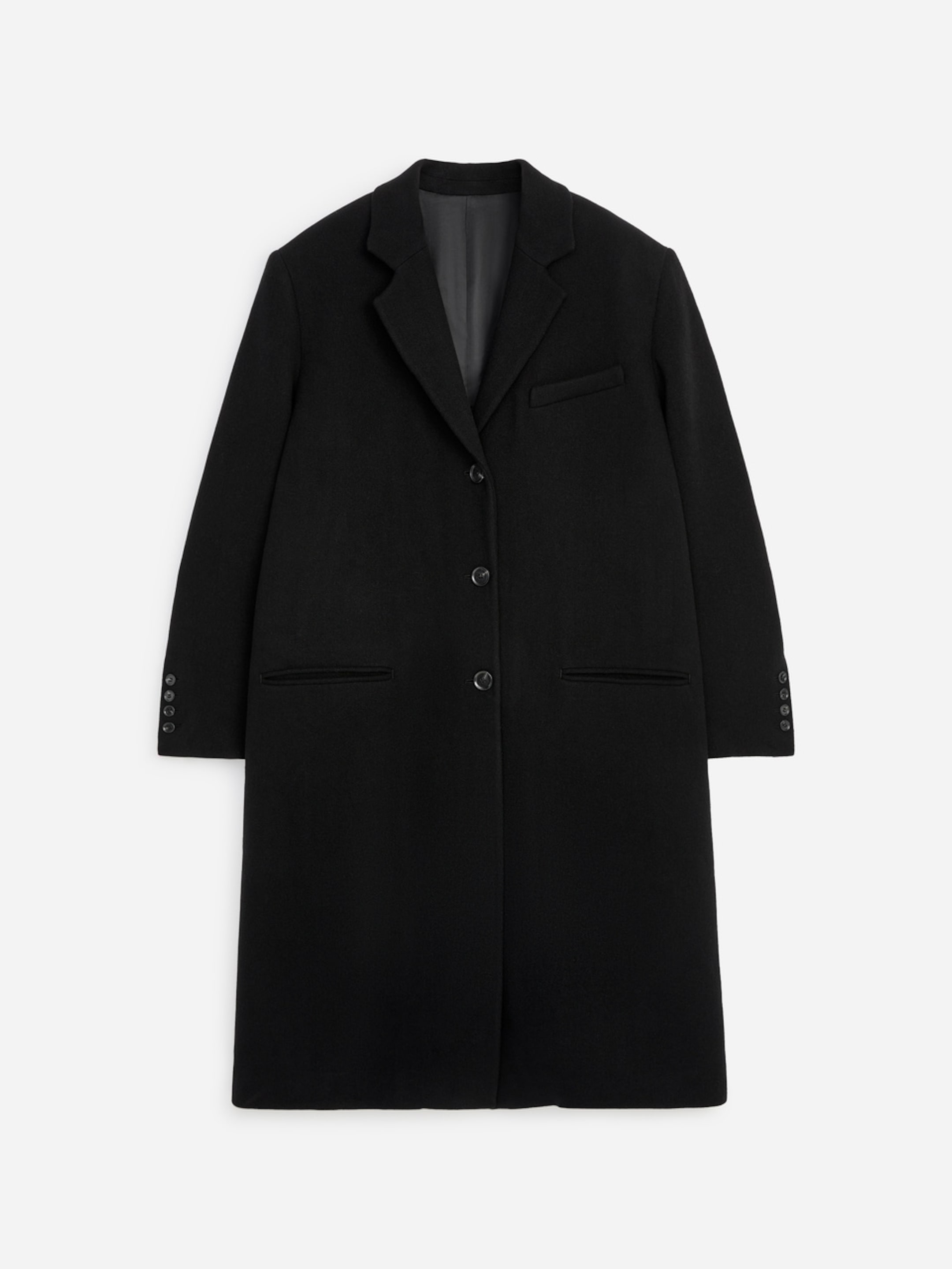 A black overcoat with a classic design, featuring a notched lapel, three-button closure, and welt pockets, set against a white background.