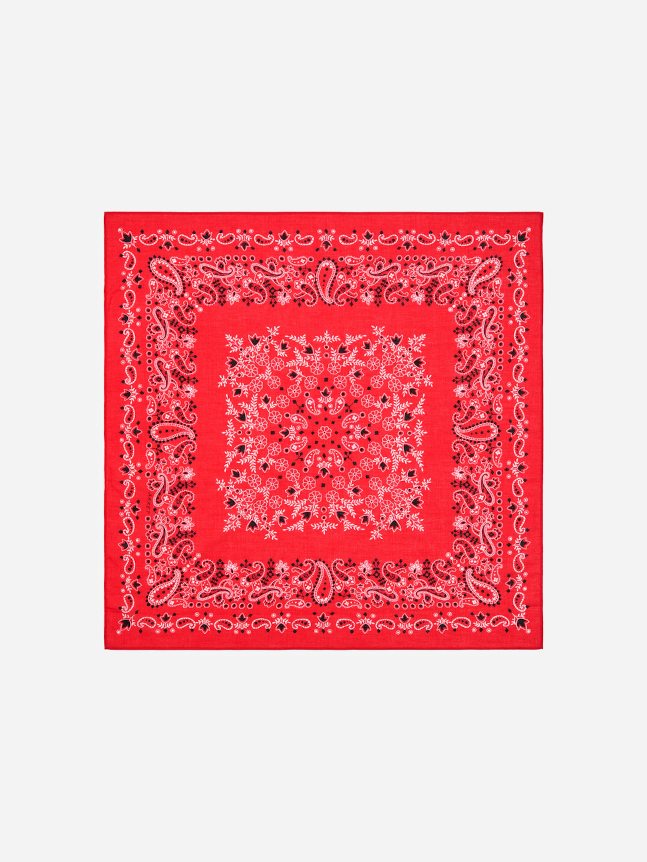 A vibrant red bandana with a classic paisley and floral pattern arranged in a symmetrical design.
