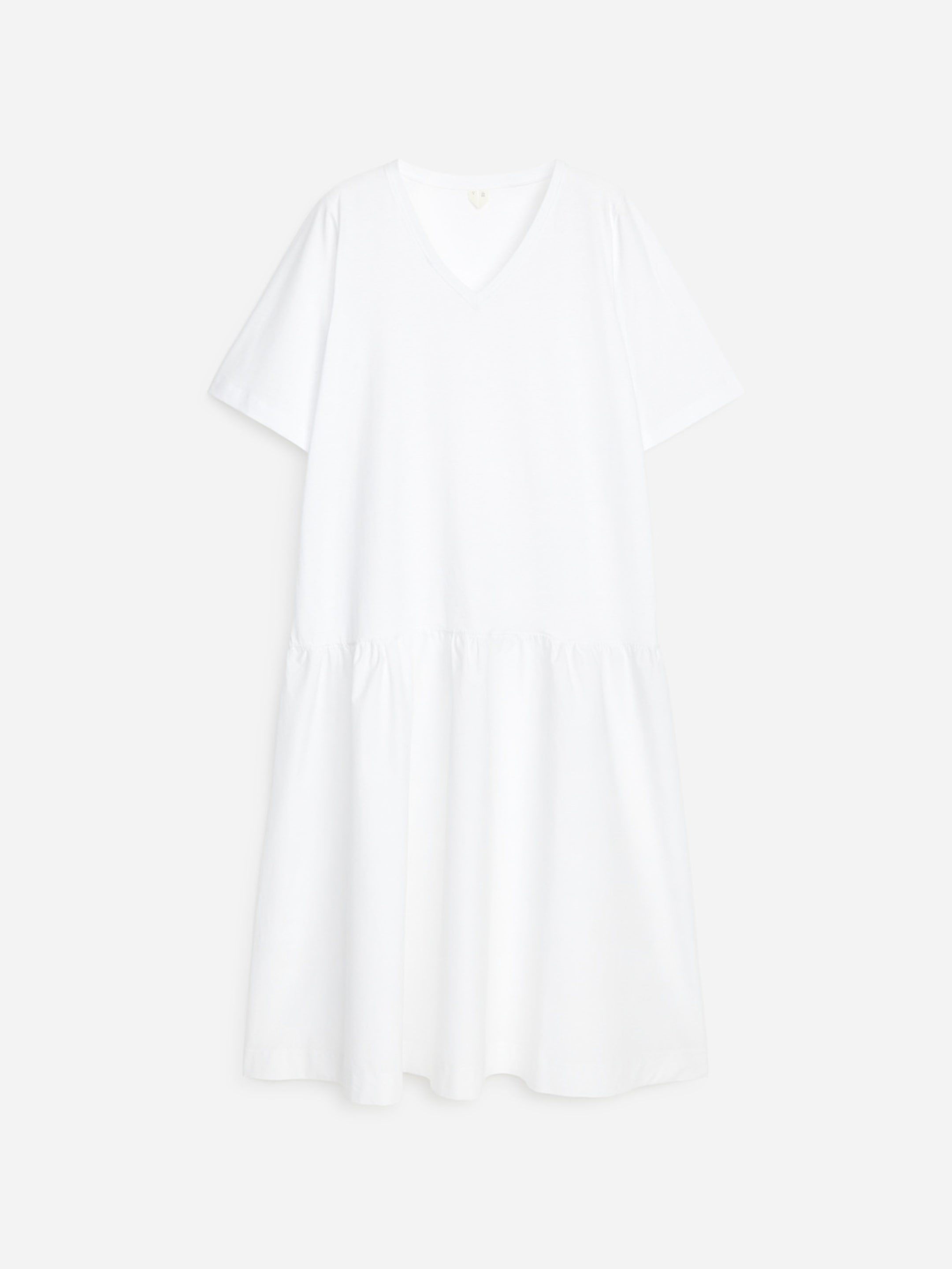White short-sleeved dress with a V-neck and gathered skirt, displayed on a white background.