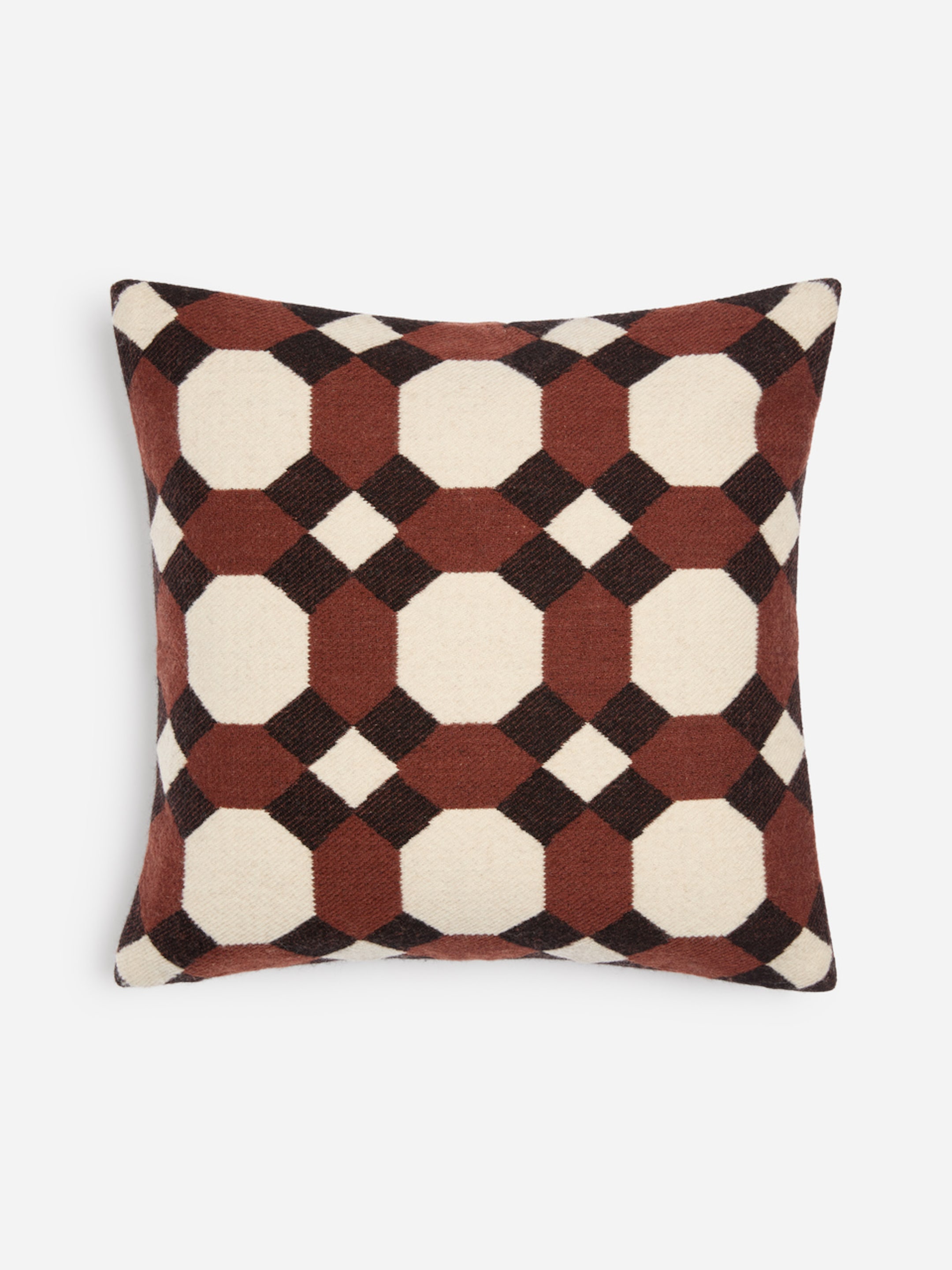 A square throw pillow with a geometric pattern featuring brown octagons and black lines on a white background.
