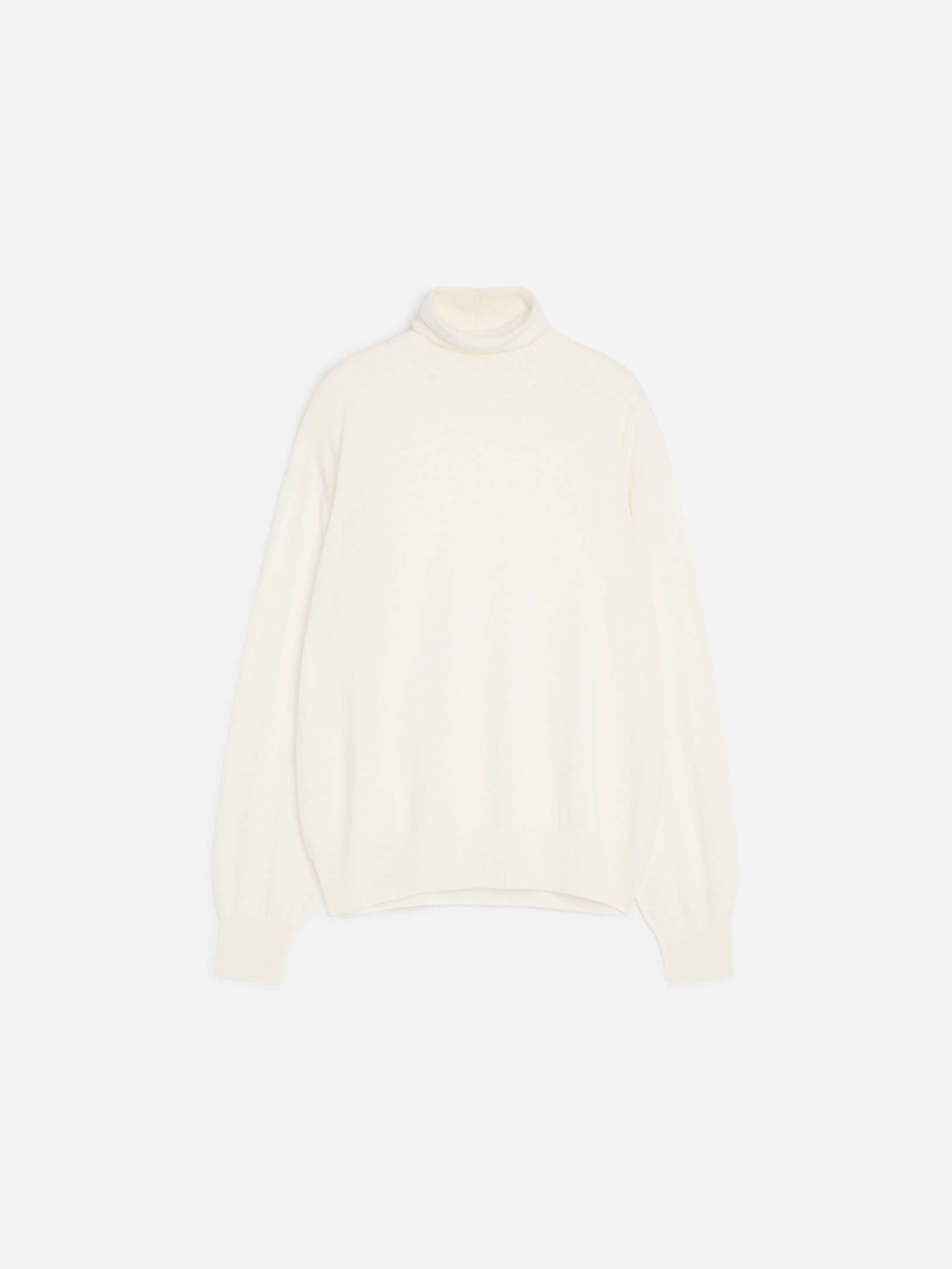 Cream-colored turtleneck sweater with long sleeves, shown against a white background.