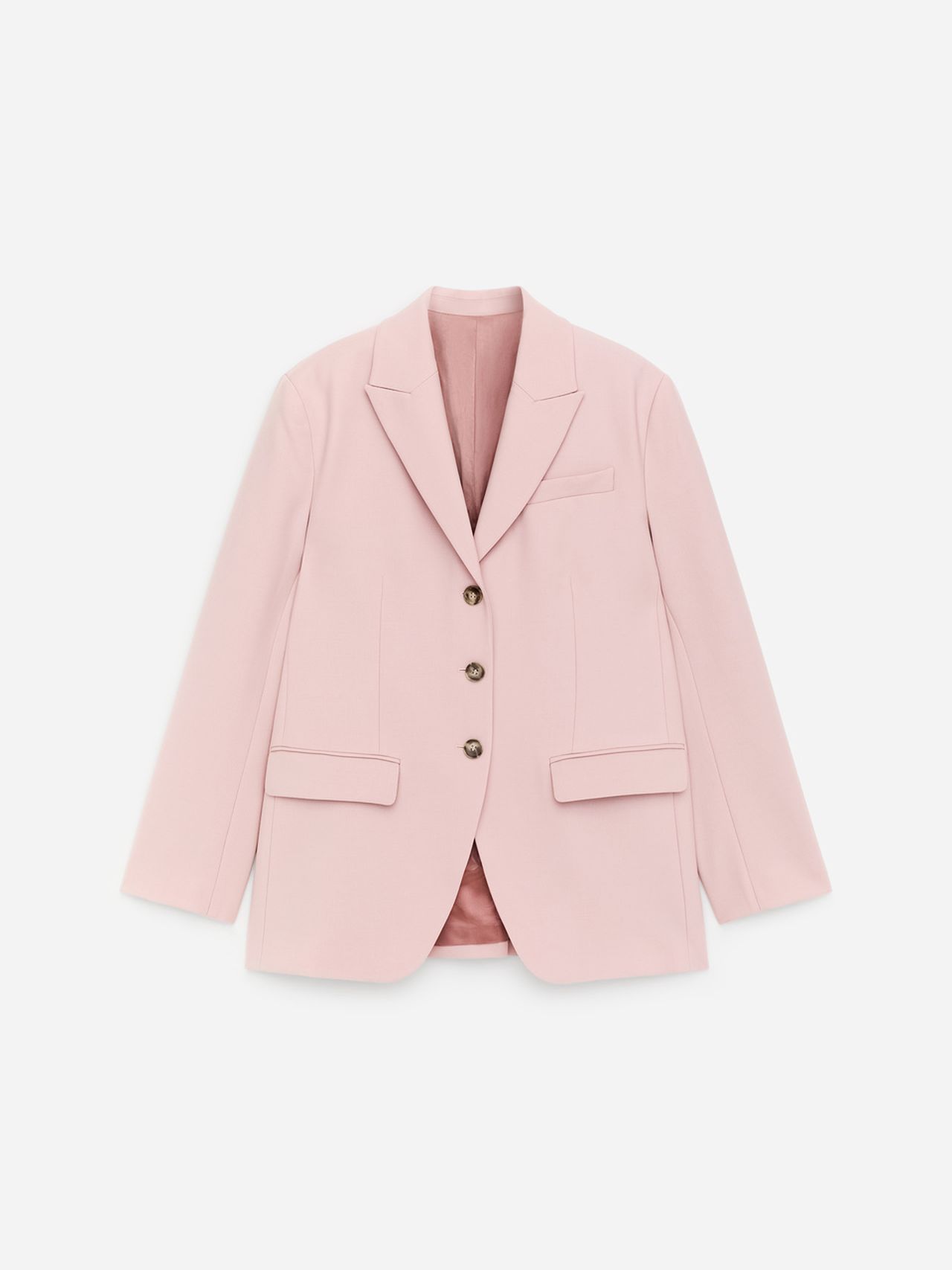 Light pink blazer with a notched collar, three buttons, and three front pockets displayed against a white background.