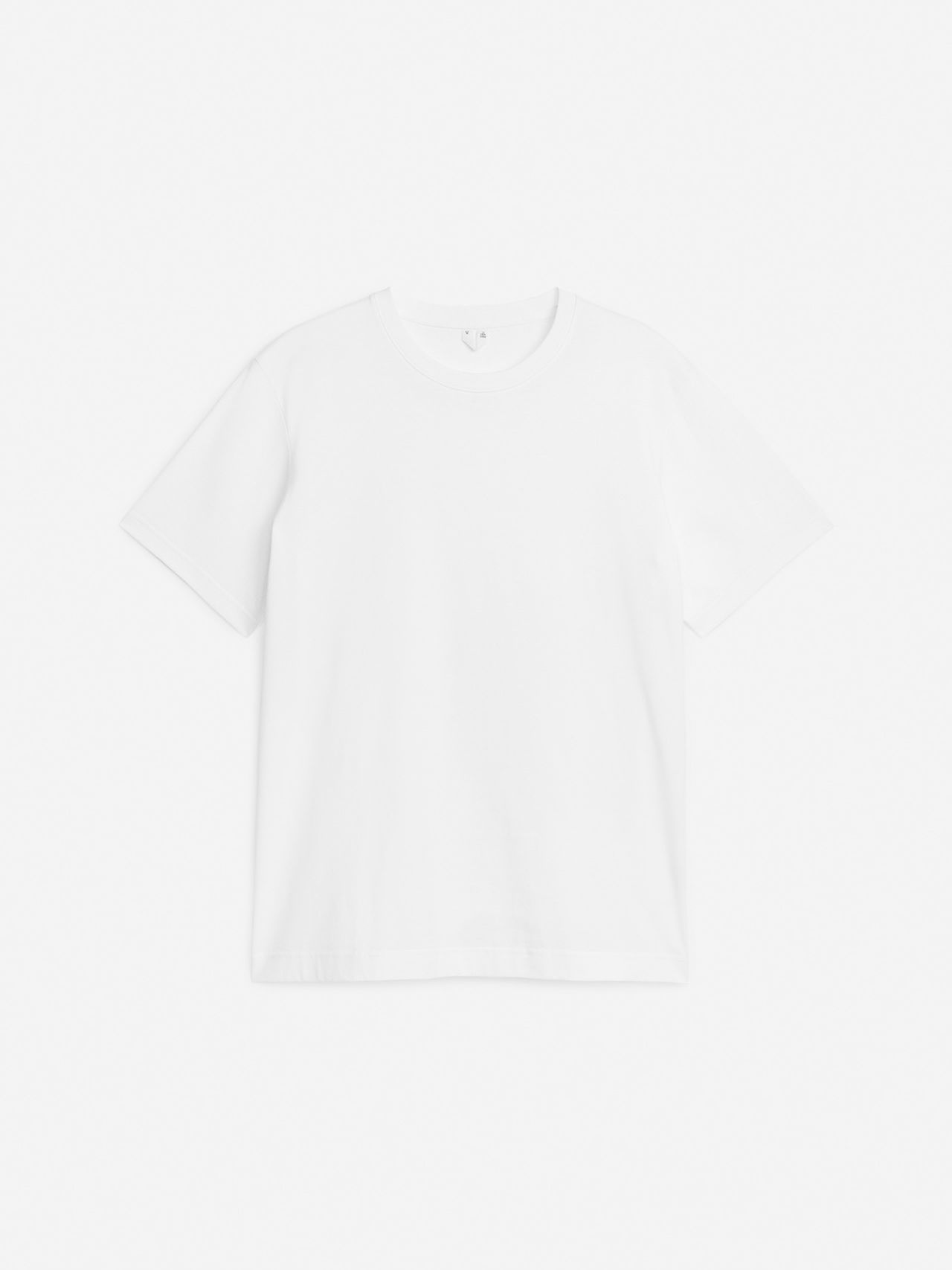 Plain white T-shirt on a white background, with short sleeves and a round neckline.