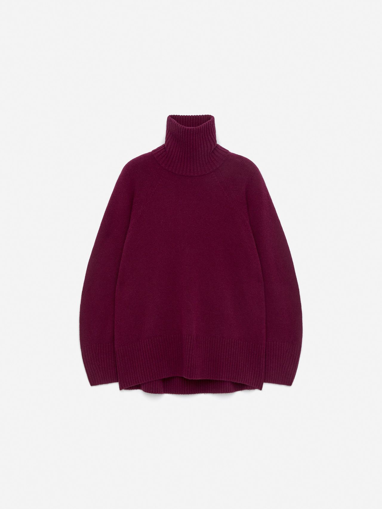 Deep burgundy turtleneck sweater with ribbed collar, cuffs and hem, laid flat on a white background.